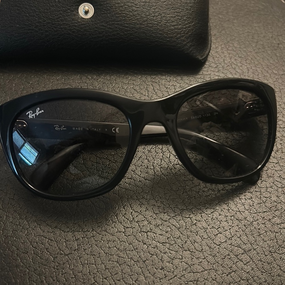 Used Rayban sunglasses, has some scratches inside lens. Comes with case!